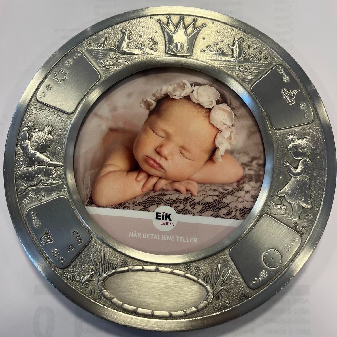 Bilde av baby i en ramme